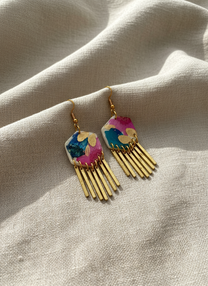 Hexagon floral polymer clay with brass fringe dangle hardware.