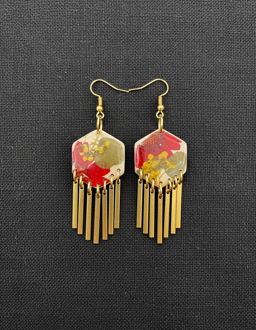 Hexagon floral polymer clay with brass fringe dangle hardware.