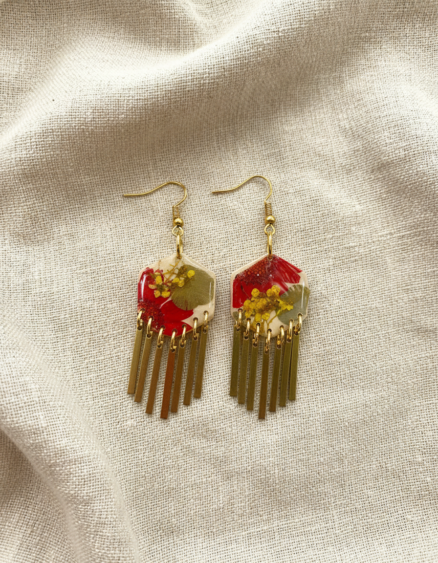 Hexagon floral polymer clay with brass fringe dangle hardware.