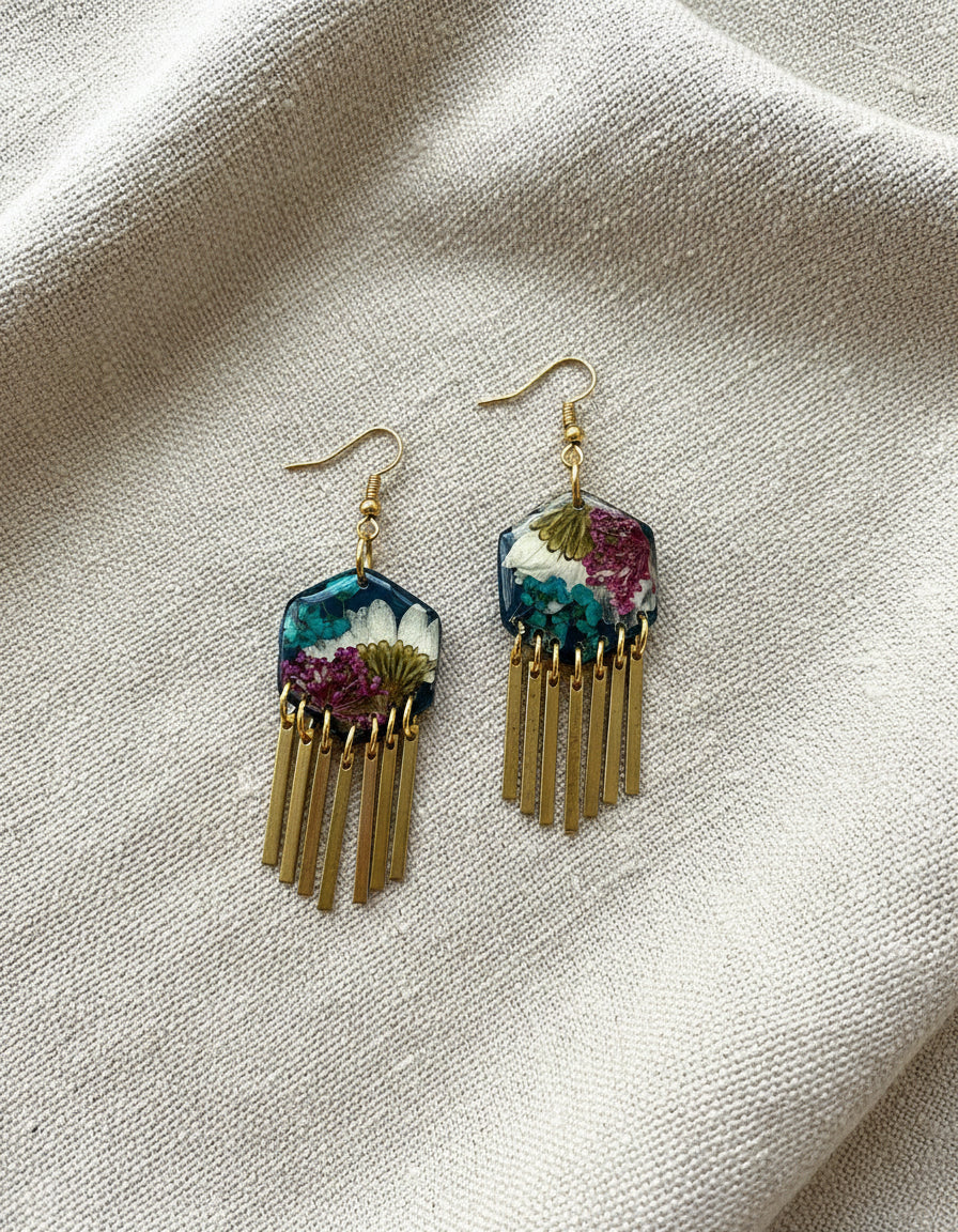 Hexagon floral polymer clay with brass fringe dangle hardware.