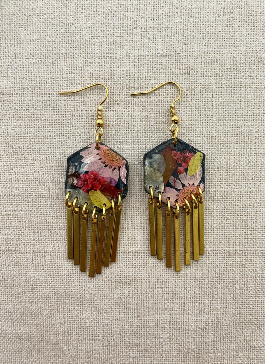 Hexagon floral polymer clay with brass fringe dangle hardware.