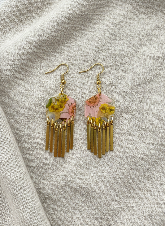 Hexagon floral polymer clay with brass fringe dangle hardware.