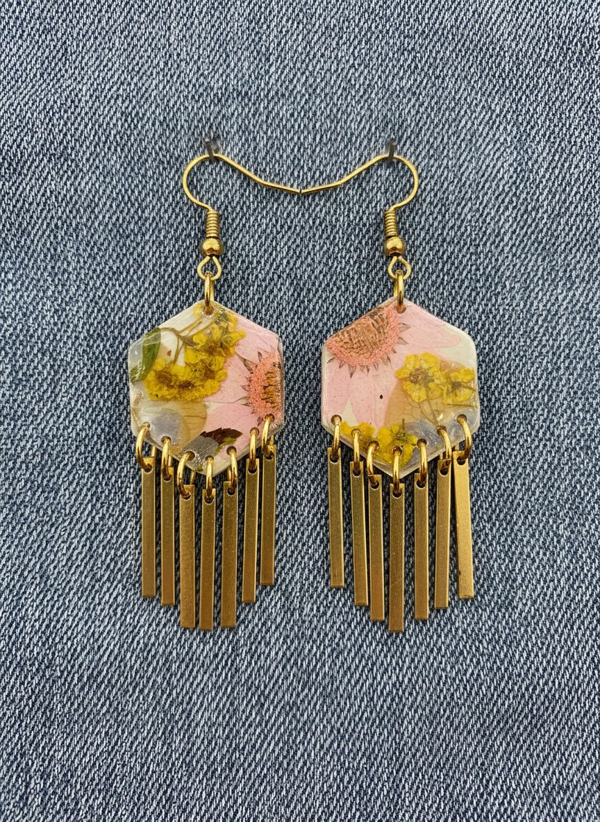 Hexagon floral polymer clay with brass fringe dangle hardware.