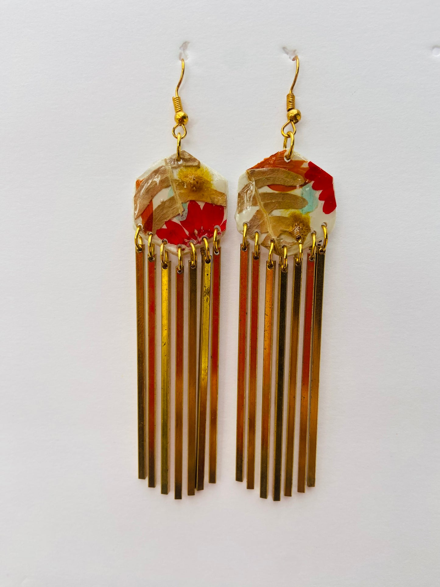 Hexagon dangle polymer clay with brass fringe dangle hardware.