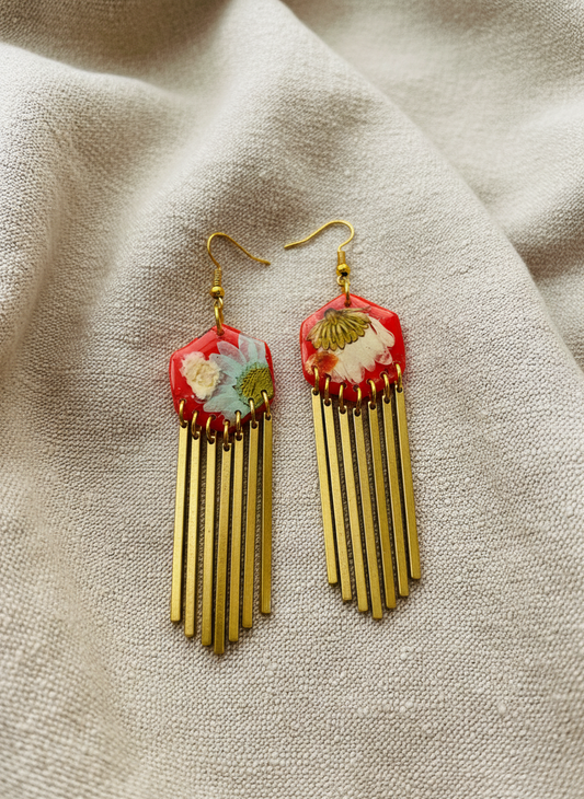 Hexagon floral polymer clay with brass fringe dangle hardware.