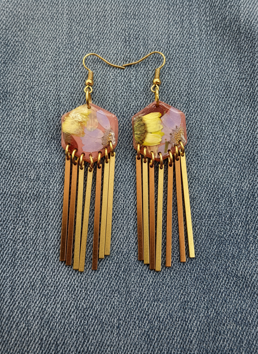 Hexagon floral polymer clay with brass fringe dangle hardware.