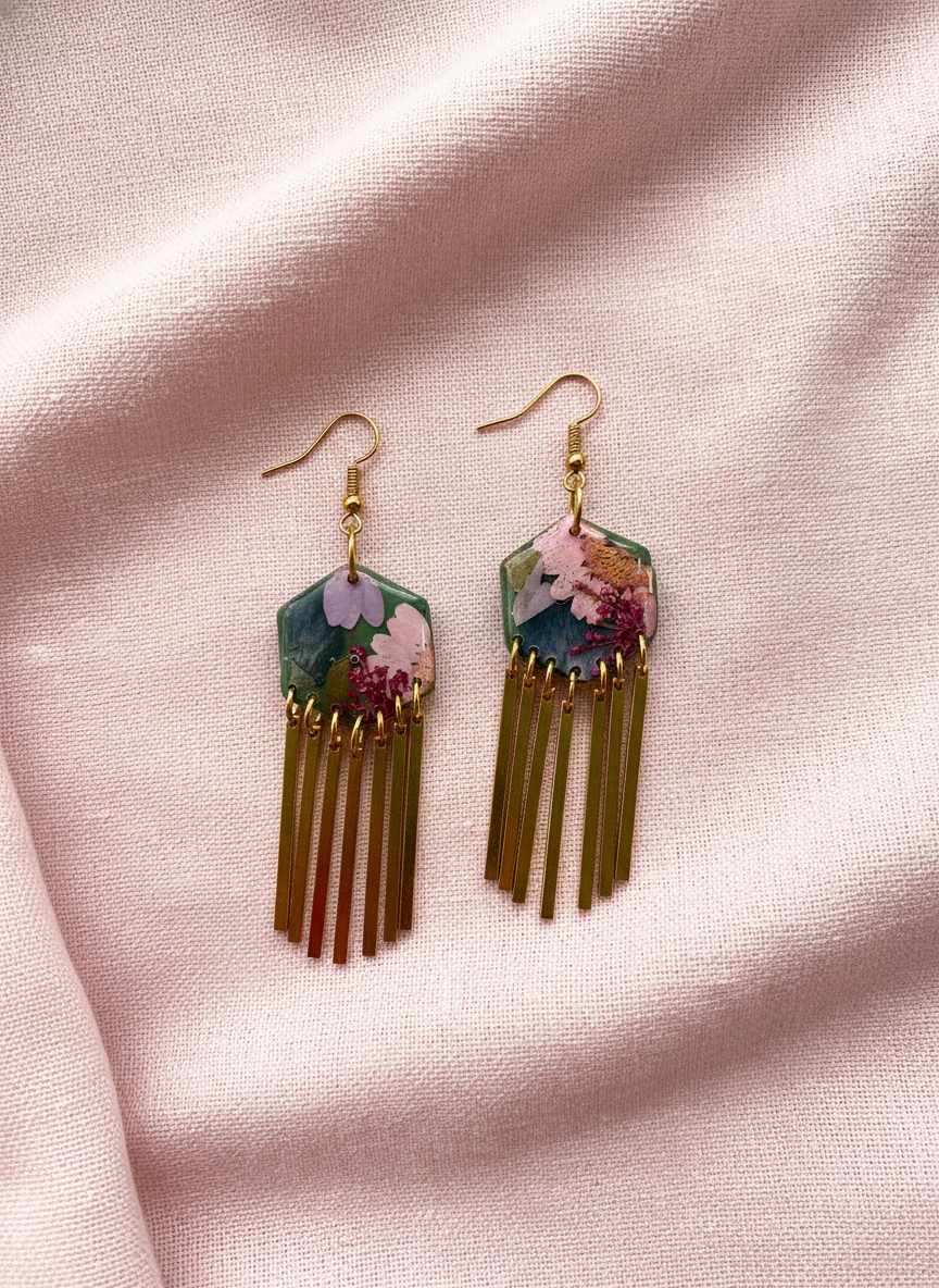 Hexagon floral polymer clay with brass fringe dangle hardware.
