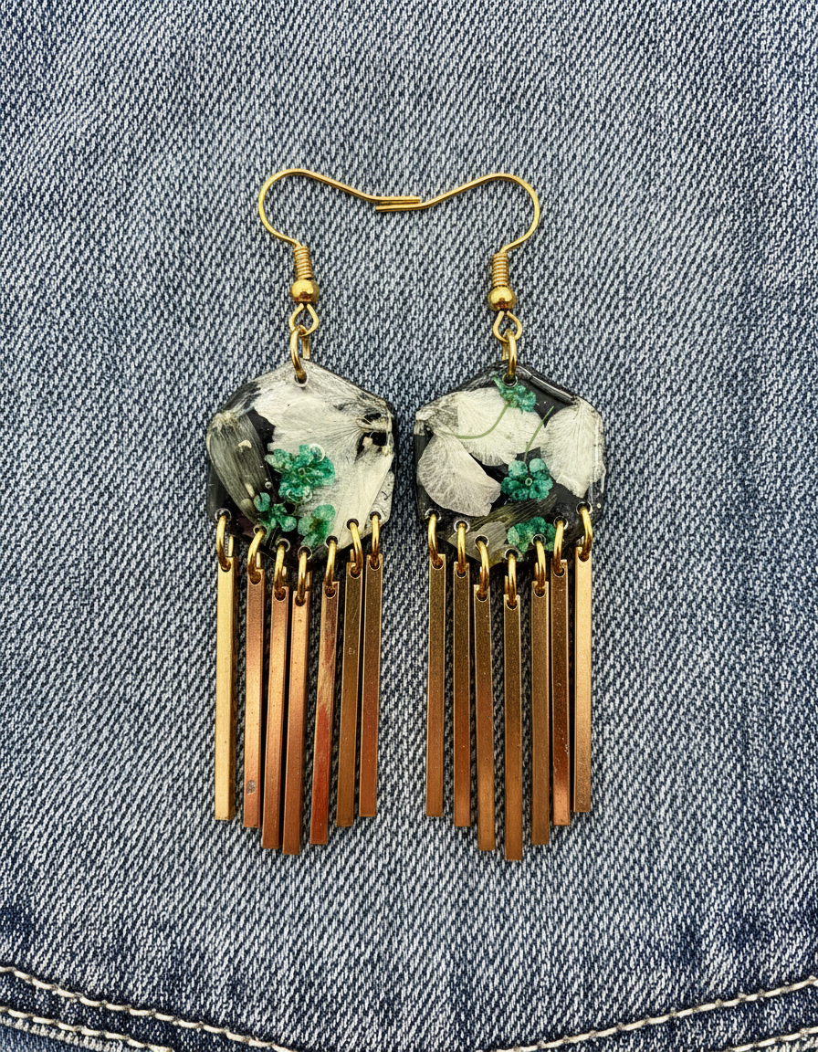 Hexagon floral polymer clay with brass fringe dangle hardware.