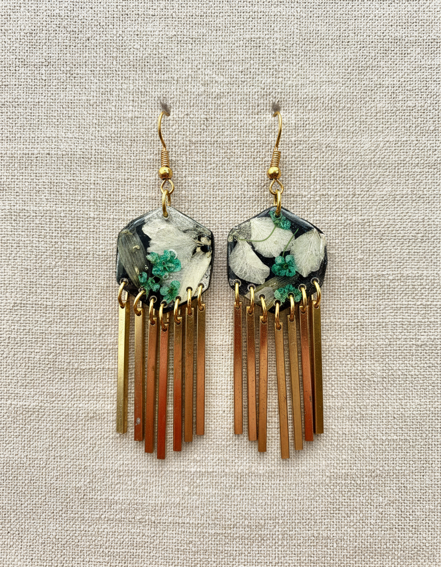 Hexagon floral polymer clay with brass fringe dangle hardware.